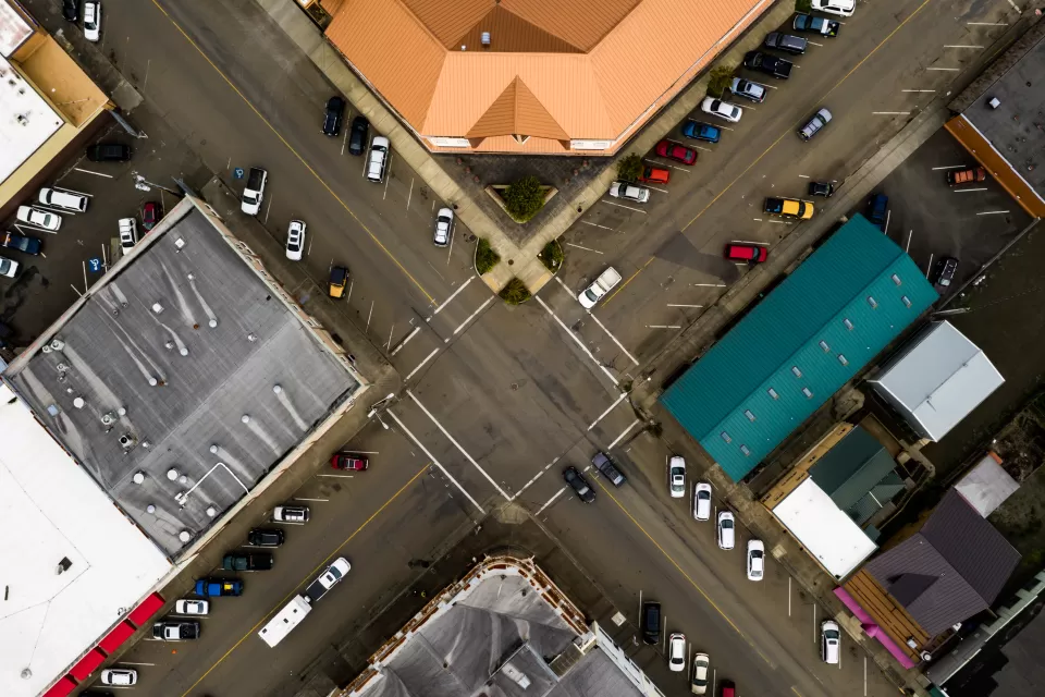 Aerial view of strip mall with diagonal parking spots in Coquille, Oregon